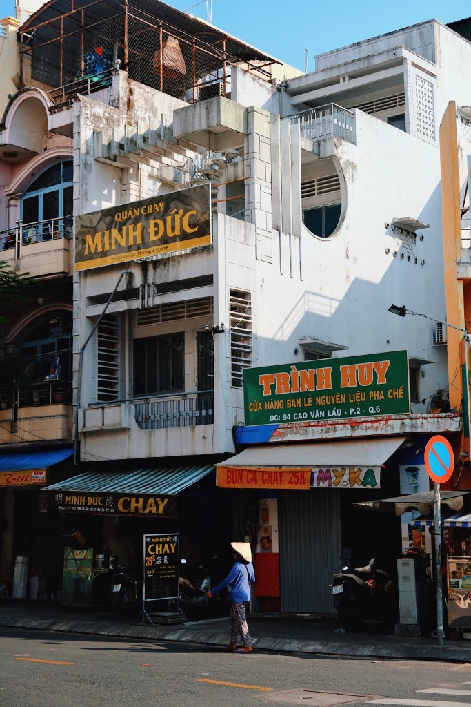 A modernist shophouse in Ho Chi Minh City featuring striking geometric architectural elements such as pergolas.