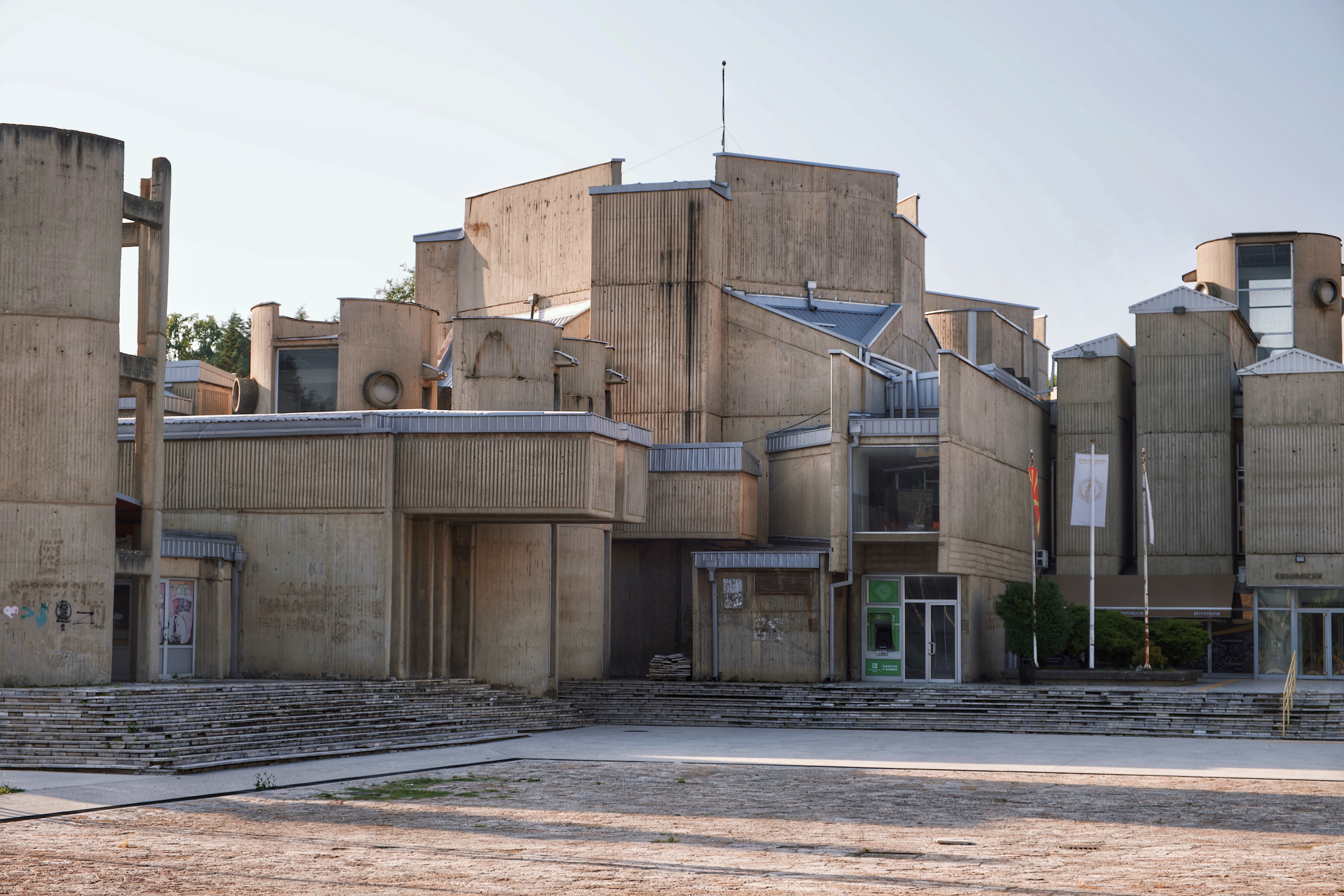 Brutalist concrete facade of Ss. Cyril and Methodius University in Skopje, a key example of modernist architecture in post-earthquake North Macedonia